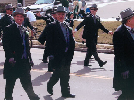 Jerry marching in a parade with the Hibernians